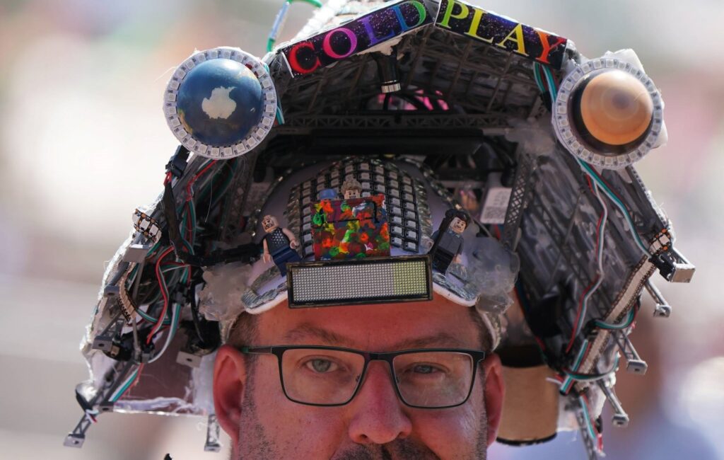 The man whose Coldplay Pyramid Stage hat was sung about by Chris Martin during Glastonbury set speaks out on “mind-blowing” experience