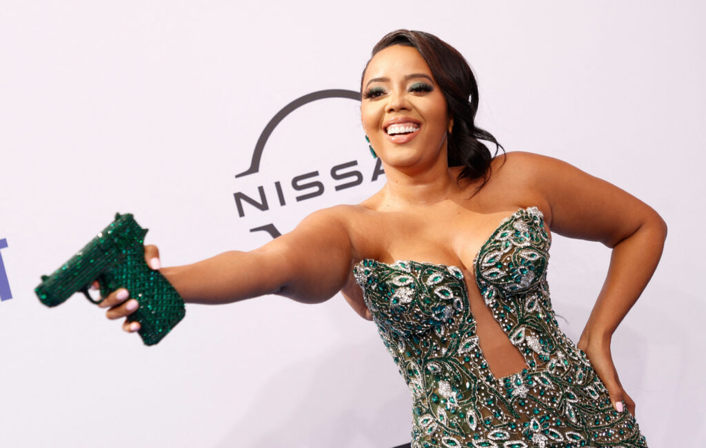 Angela Simmons apologises for wearing gun-shaped purse