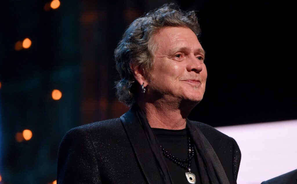 Def Leppard’s Rick Allen “going through some challenging times” after “very traumatic” violent attack two years ago