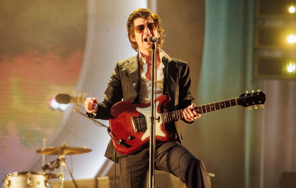 Watch Alex Turner make surprise appearance at Music Week Awards to honour Arctic Monkeys’ manager