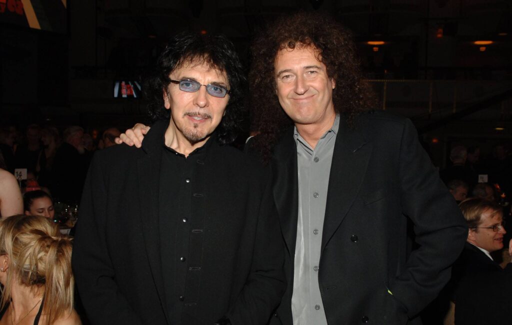 Queen’s Brian May gifts Black Sabbath’s Tony Iommi with his version of left-handed Red Special replica guitar