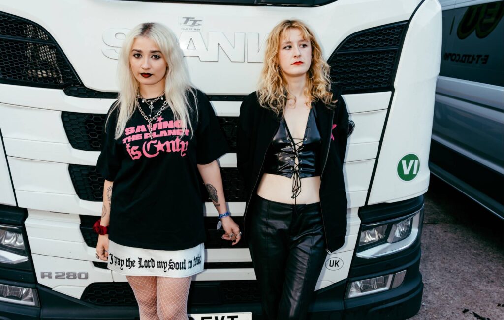 Lambrini Girls and Music Declares Emergency team up for ‘Hot Girls F*ck The System’ merch collection