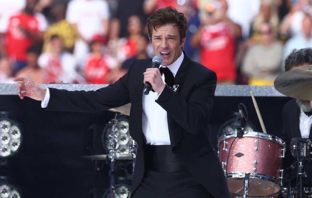 Watch Brandon Flowers debut new songs, air Killers classics and perform with Lucy Dacus and Nathaniel Rateliff at Newport Folk Festival