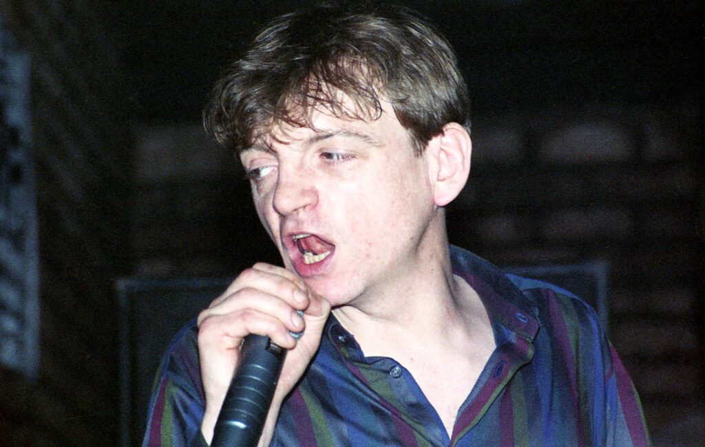 Mark E Smith’s fiancée and last manager hits out at The Fall’s final album as “cash grab” and “ethically wrong”