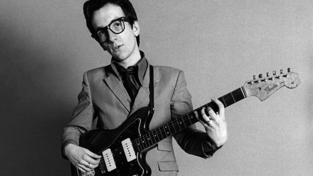 Elvis Costello Interview: Origins of His Stage Name, Writing ‘Alison’