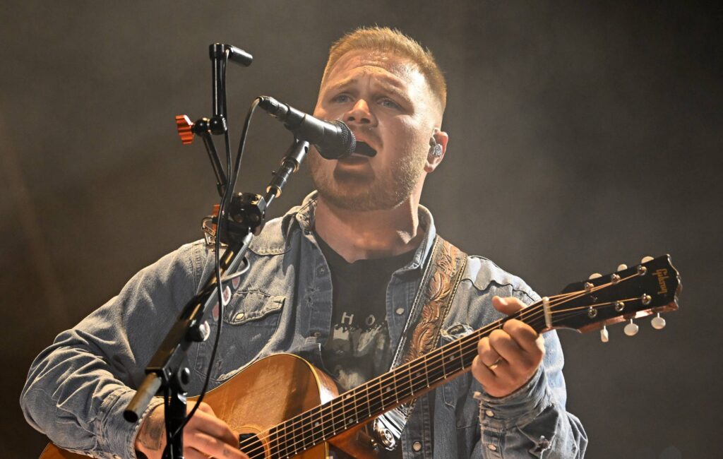 Zach Bryan wears ‘Free Palestine’ shirt at Gillette Stadium following Robert Kraft-Macklemore row